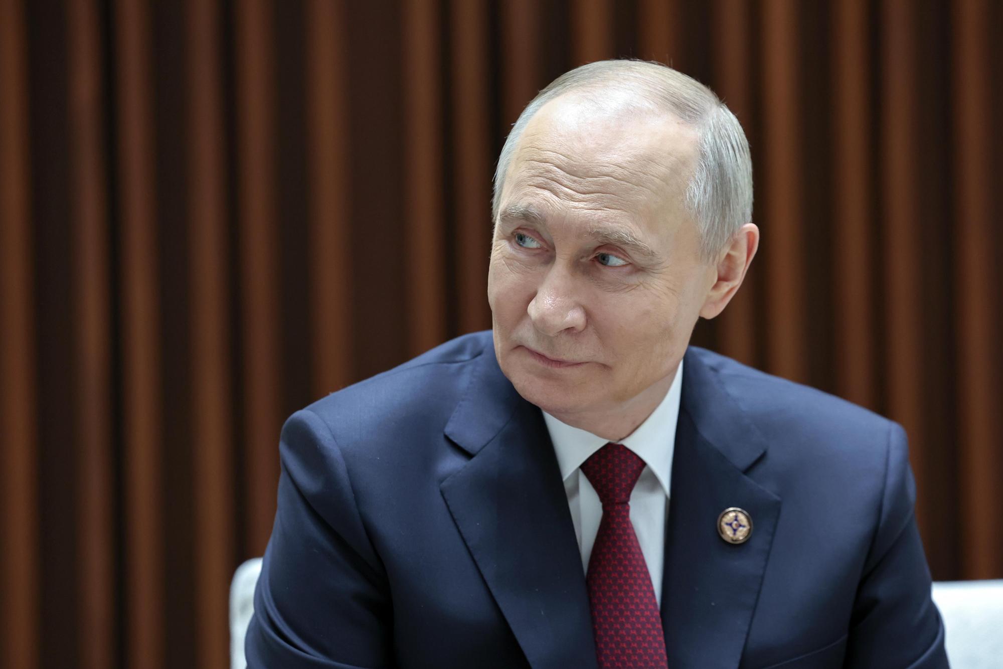 Владимир Путин